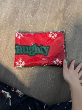 Red 'Naughty' Holiday Knit Scarf with White Snowflakes